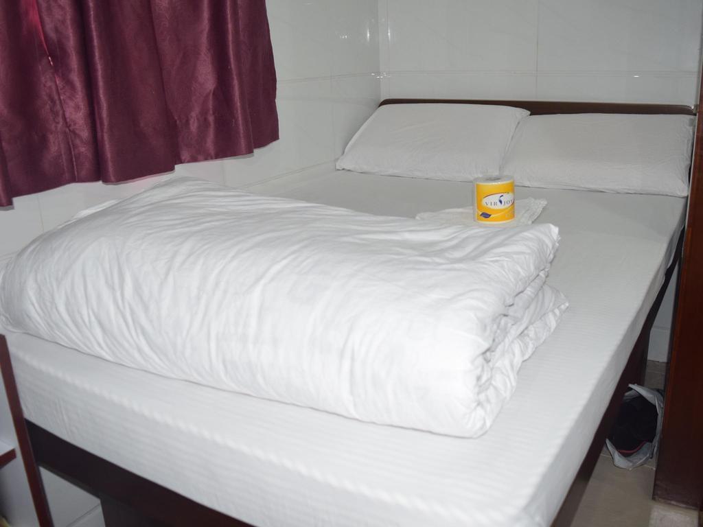 Om Guest House Hongkong Pokoj fotografie