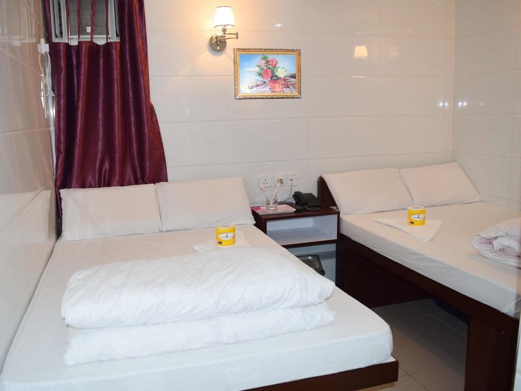 Om Guest House Hongkong Pokoj fotografie