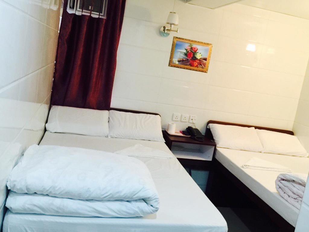 Om Guest House Hongkong Pokoj fotografie