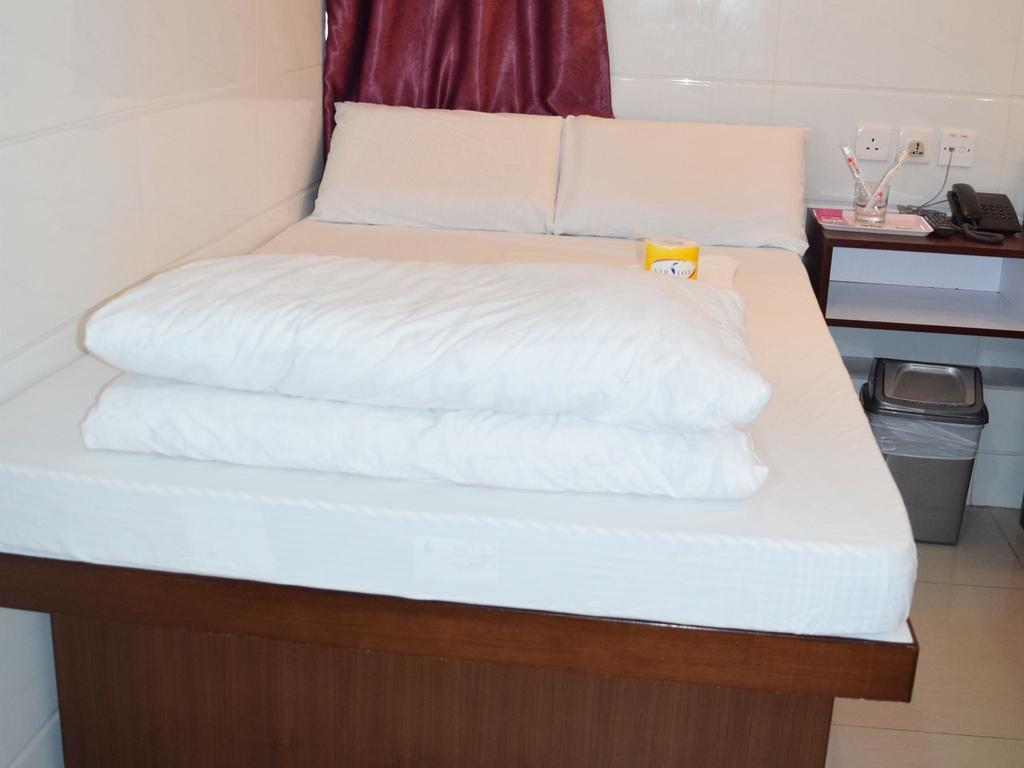 Om Guest House Hongkong Pokoj fotografie